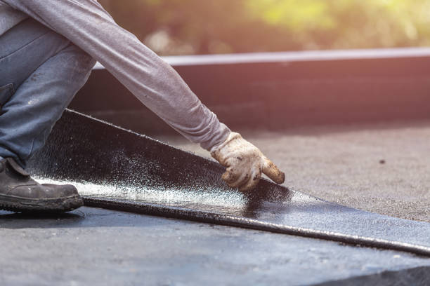 Professional Basement Waterproofing technician working in Adrian, MN
